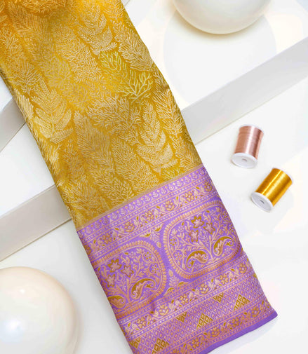 Fancy Seamless Leaves Pattern Tissue Silk Saree