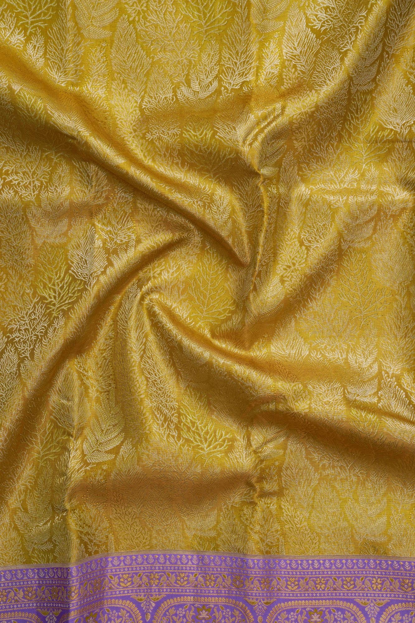Fancy Seamless Leaves Pattern Tissue Silk Saree