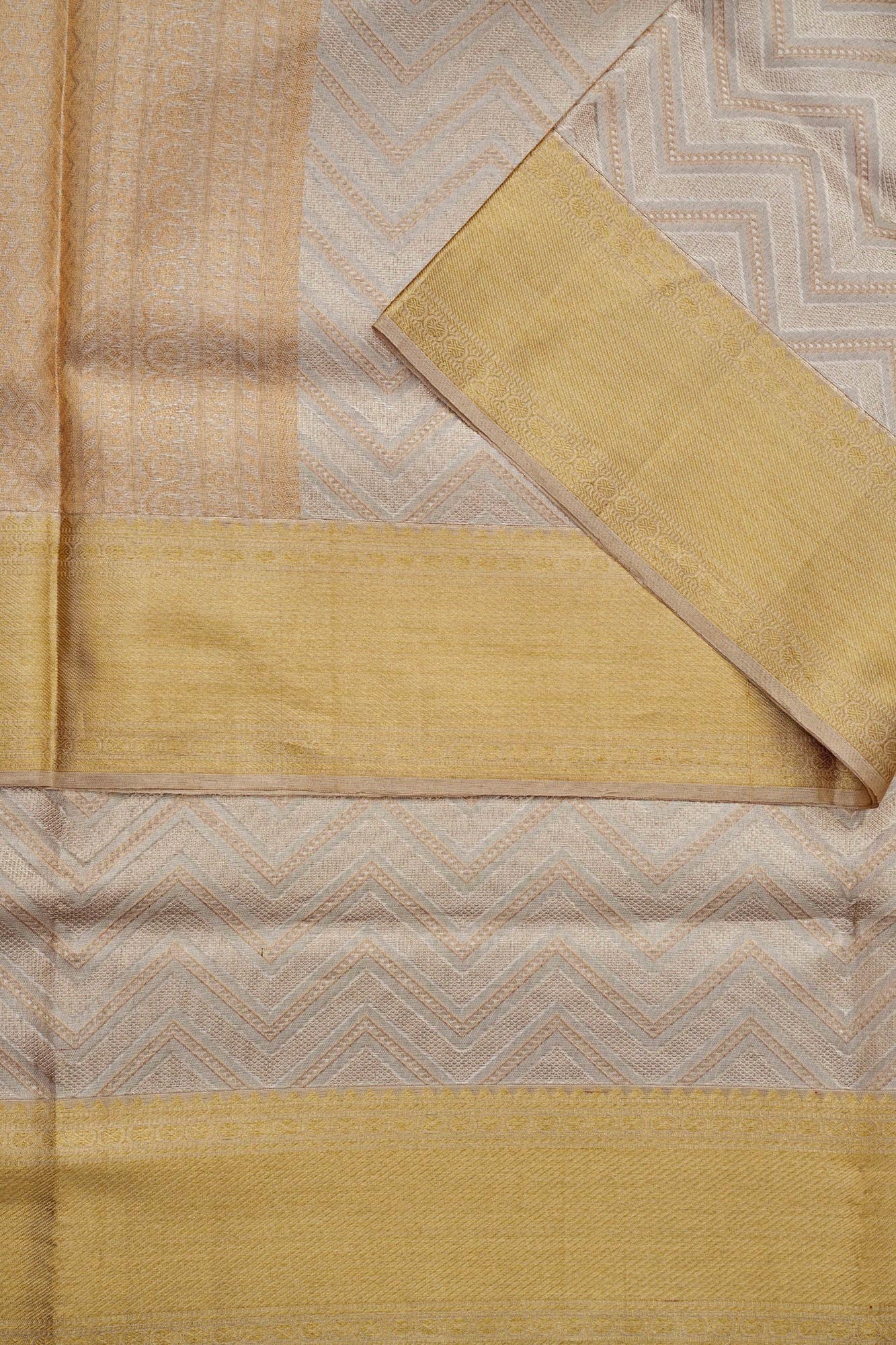Zig Zag Fancy Pattern Tissue Silk Saree (Silver touch revalue)
