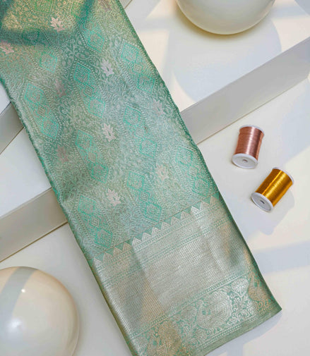 Geometric Diamond Ikat & Peacock Arch Border Sea-Green Pure Tissue Silk Saree