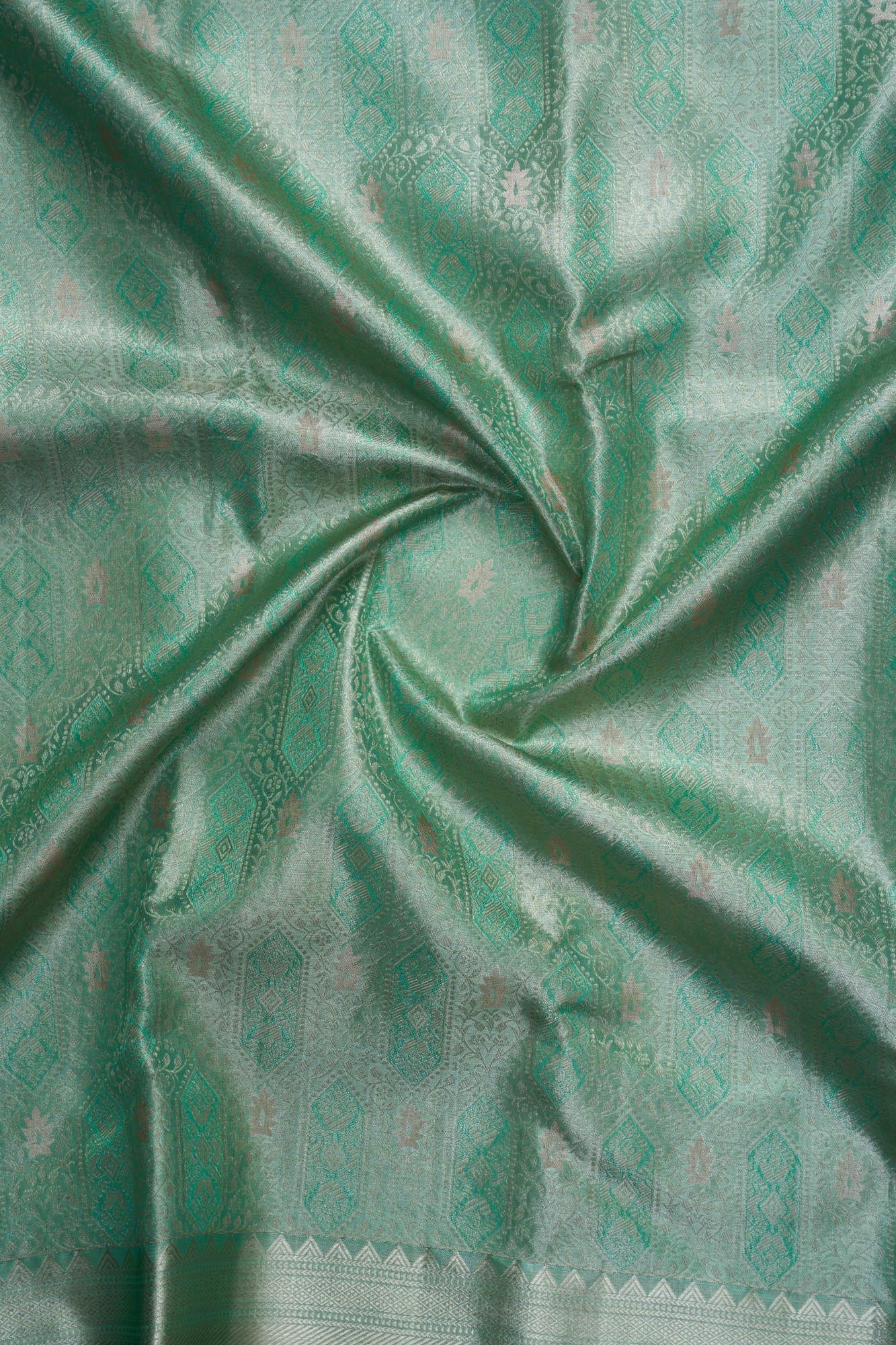 Geometric Diamond Ikat & Peacock Arch Border Sea-Green Pure Tissue Silk Saree